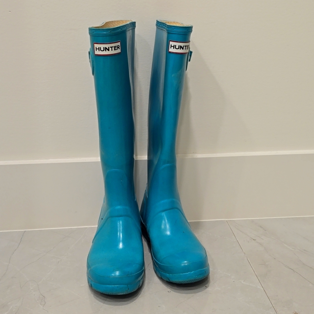 Hunter Tall rain boots.